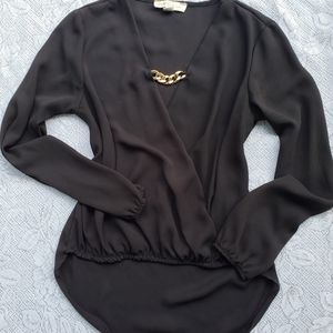 Women black long sleeved blouse